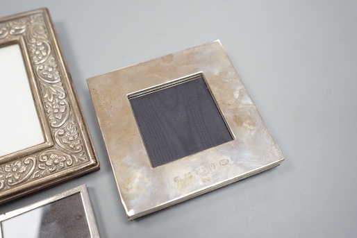 Three modern silver mounted photograph frames, largest 17.9cm.